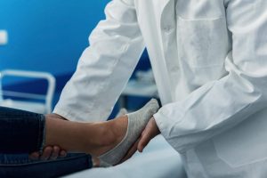 Should I See a Podiatrist or Orthopedist for Foot Pain?